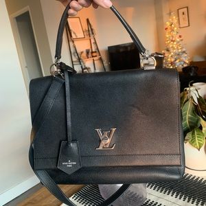 Louis Vuitton MYLOCKME SATCHEL - Used/Like New. Retail: $4,100 Selling: $2,500.